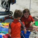 Amanda (10) & Jack (7) enjoying our Deluxe Beach Package and a Bag o' Beach Toys.